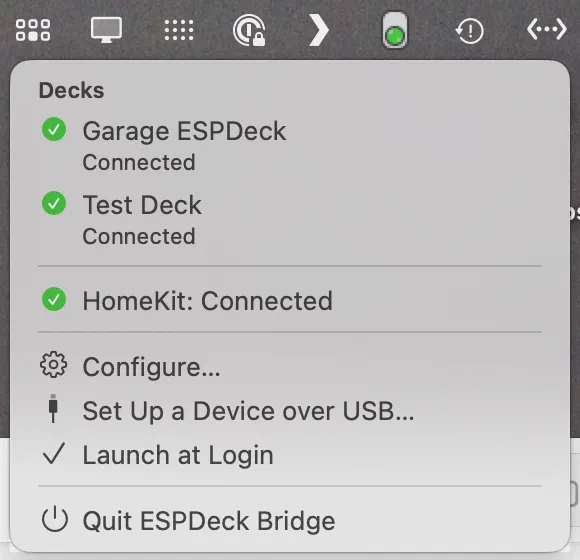 The menu bar menu, listing two decks as connected, HomeKit as connected, and the Configure, Set Up a Device over USB, Launch at Login and Quit commands.